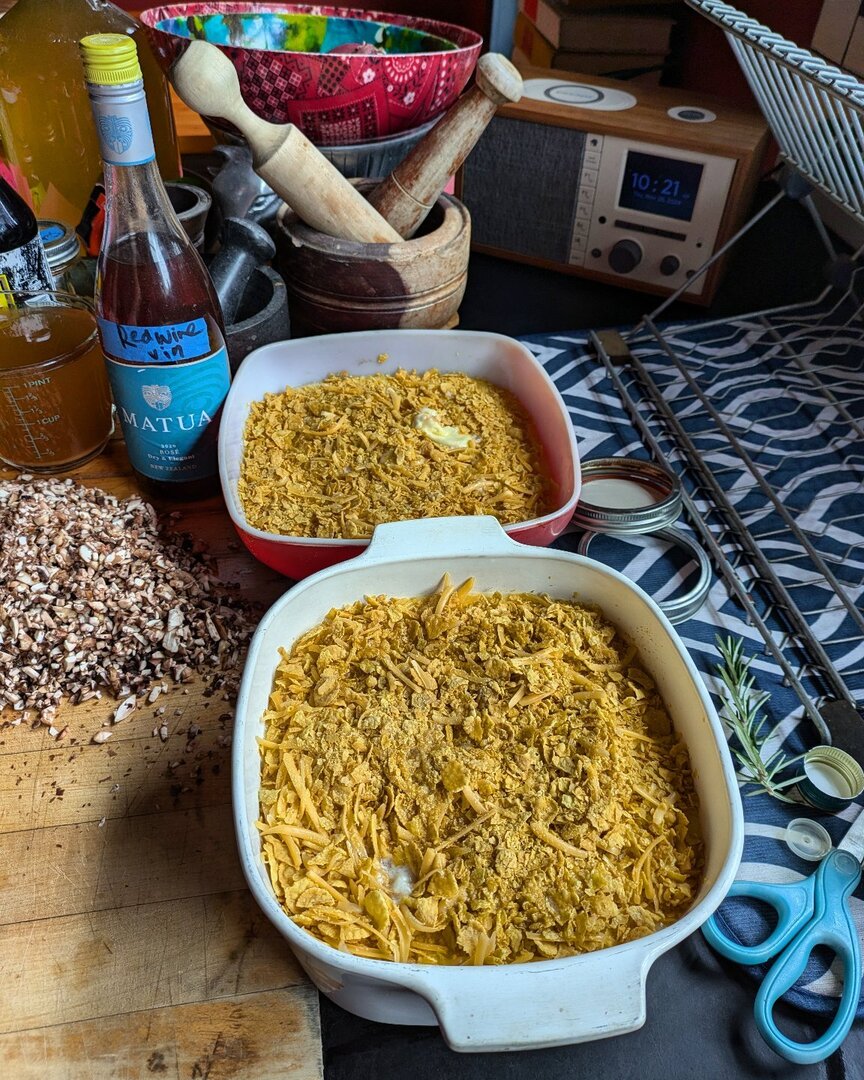 Thanksgiving Garlic Cheese Grits Casserole in the oven! Old beloved family recipe that's in my #dumplingsequallovebook. Grits plus lots and lots of butter, sharp cheddar, garlic + eggs, milk. All topped with crushed cornflakes, melted butter and cheddar.… instagr.am/p/DC7V5AHS_yr/