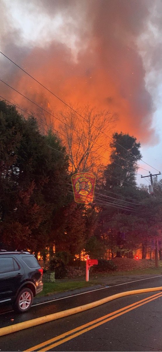 ctfirephoto's tweet image. PHOTO UPDATE FROM WESTON: on scene photos from CFPA Connecticut member Sayje Benjamin @SayjeBPhotos shows heavy fire throughout as rain begins to fall again in #westonct @westonfiredept #westonfire