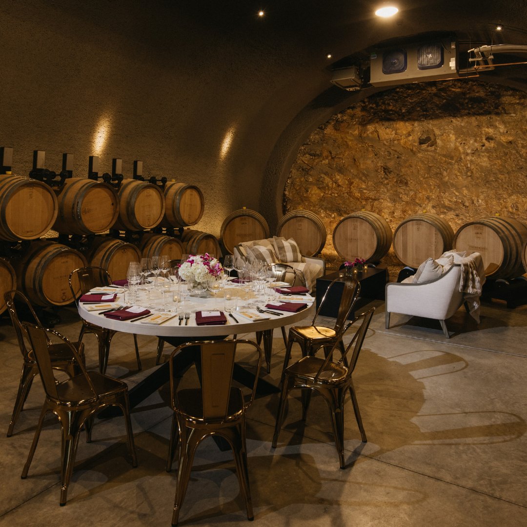 Our Hope’s Chardonnay Cave offers a cozy, exclusive setting for 16 at a farm table or up to 20 at rounds.  🍇 #WineLovers #NapaEvents #SignorelloEstate