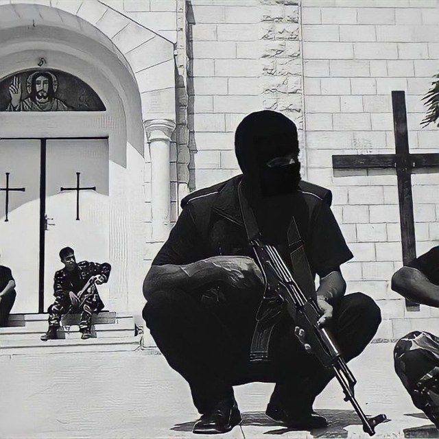 Pics that go hard: Soldiers of Al-Qassam guarding a Catholic church in Gaza where Father Manoel Musallam delivered a sermon on September 17, 2006.
