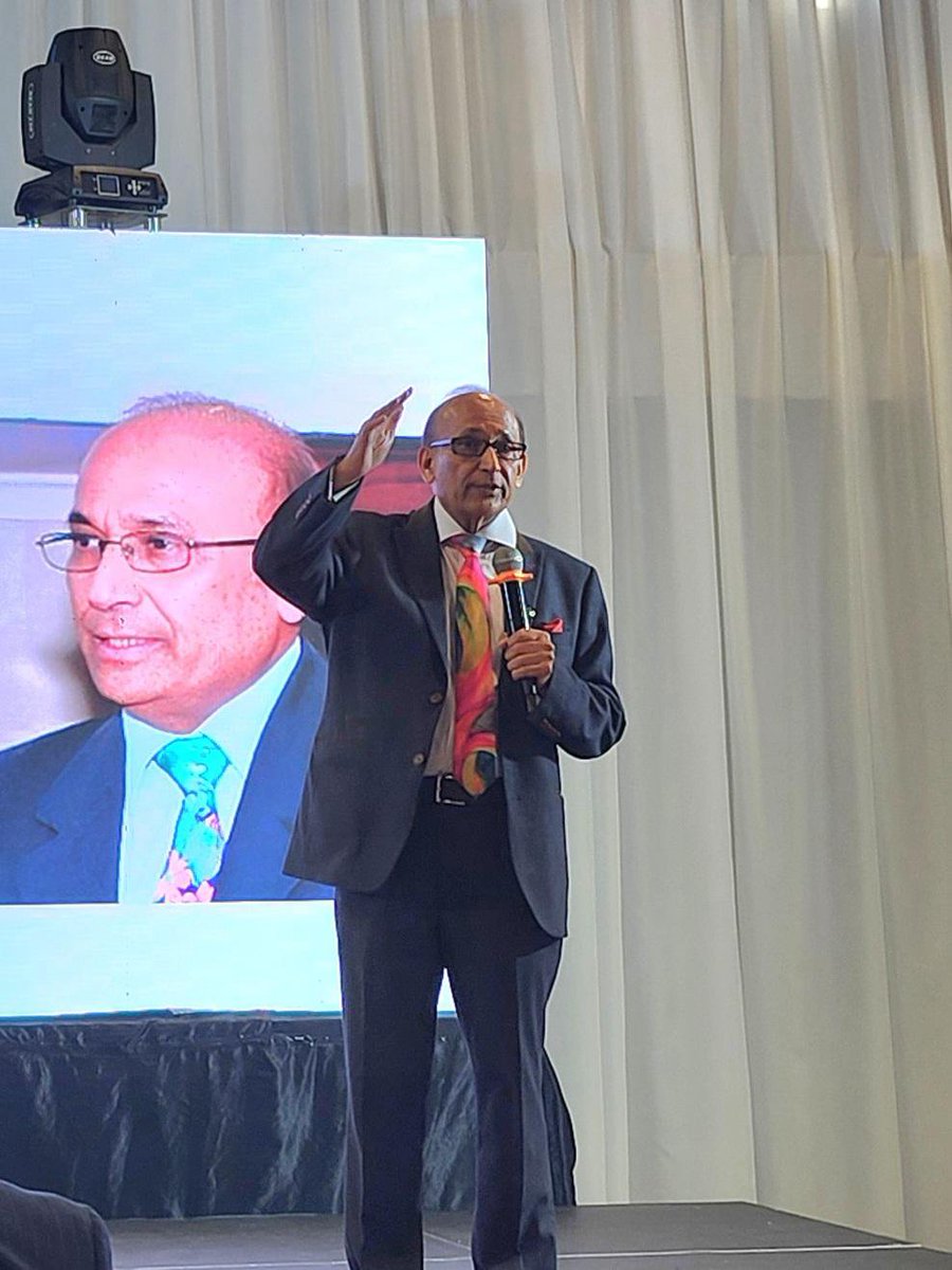 <a href="/RameshMehta15/">Ramesh Mehta CBE</a>, president <a href="/BAPIOUK/">BAPIO</a> delivering presidential address. Dr Mehta emphasised the close association of BAPIO with BINA, stating BINA is the arms-length body of BAPIO. #BINAAC2024