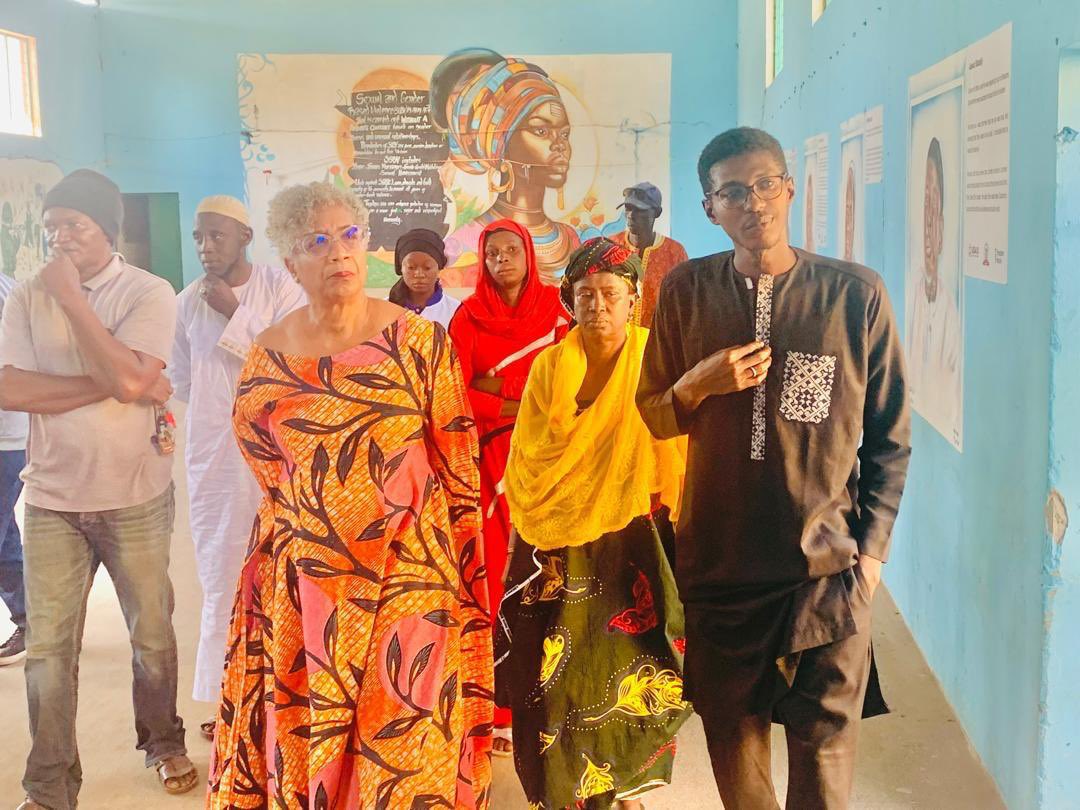 Fantanka1's tweet photo. We are thrilled to announce that U.S. Ambassador Sharon Cromer visited FANTANKA’s #FATAYLA #memorialization project on Nov 27, 2024, at Brikama Ba secondary school hall in CRR. Funded by @USAID via @PRJ_Gambia the initiative highlights the April 10/11, 2000 protests & #SGBV. https://t.co/ozBbPUFDKB