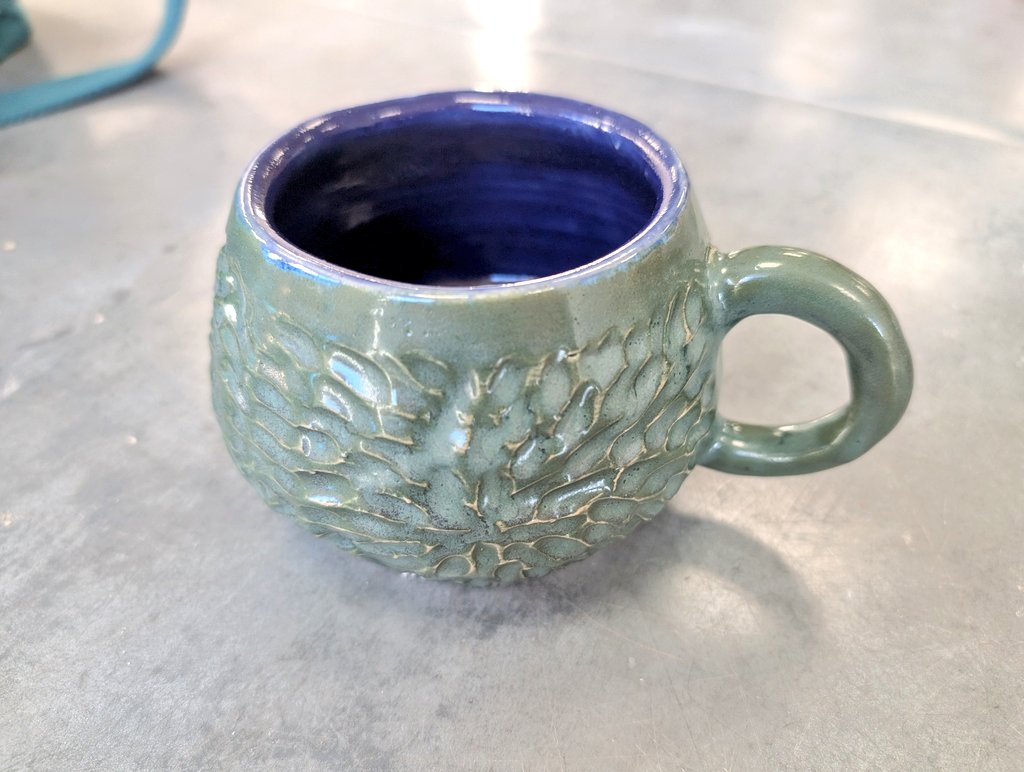 Reellie70's tweet image. This mug came back &amp;amp; I used my #Amaco brush on glazes with tourmaline on the outside &amp;amp; inside was a mix celadons cobalt &amp;amp; Snapdragon at 50/50 to make a purple. #pottery #ceramics
