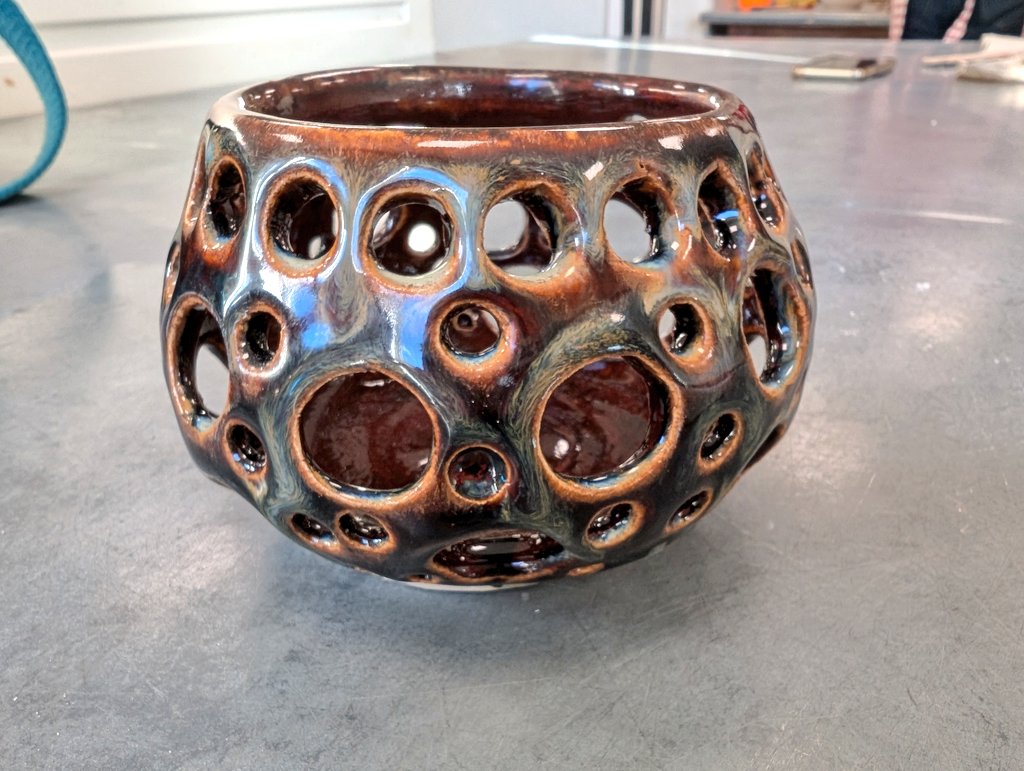 Reellie70's tweet image. My tea light candle holder was back &amp;amp; I used the same glazed as a vase I made but have got a totally different coloured piece. This was inside #Amaco  2x Deep Firebrick 1x Temmoku. Outside 2x Temmoku 2x Textured Turquoise #pottery #ceramics