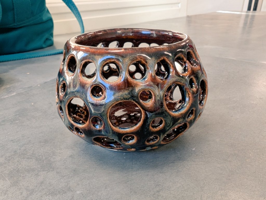 Reellie70's tweet image. My tea light candle holder was back &amp;amp; I used the same glazed as a vase I made but have got a totally different coloured piece. This was inside #Amaco  2x Deep Firebrick 1x Temmoku. Outside 2x Temmoku 2x Textured Turquoise #pottery #ceramics