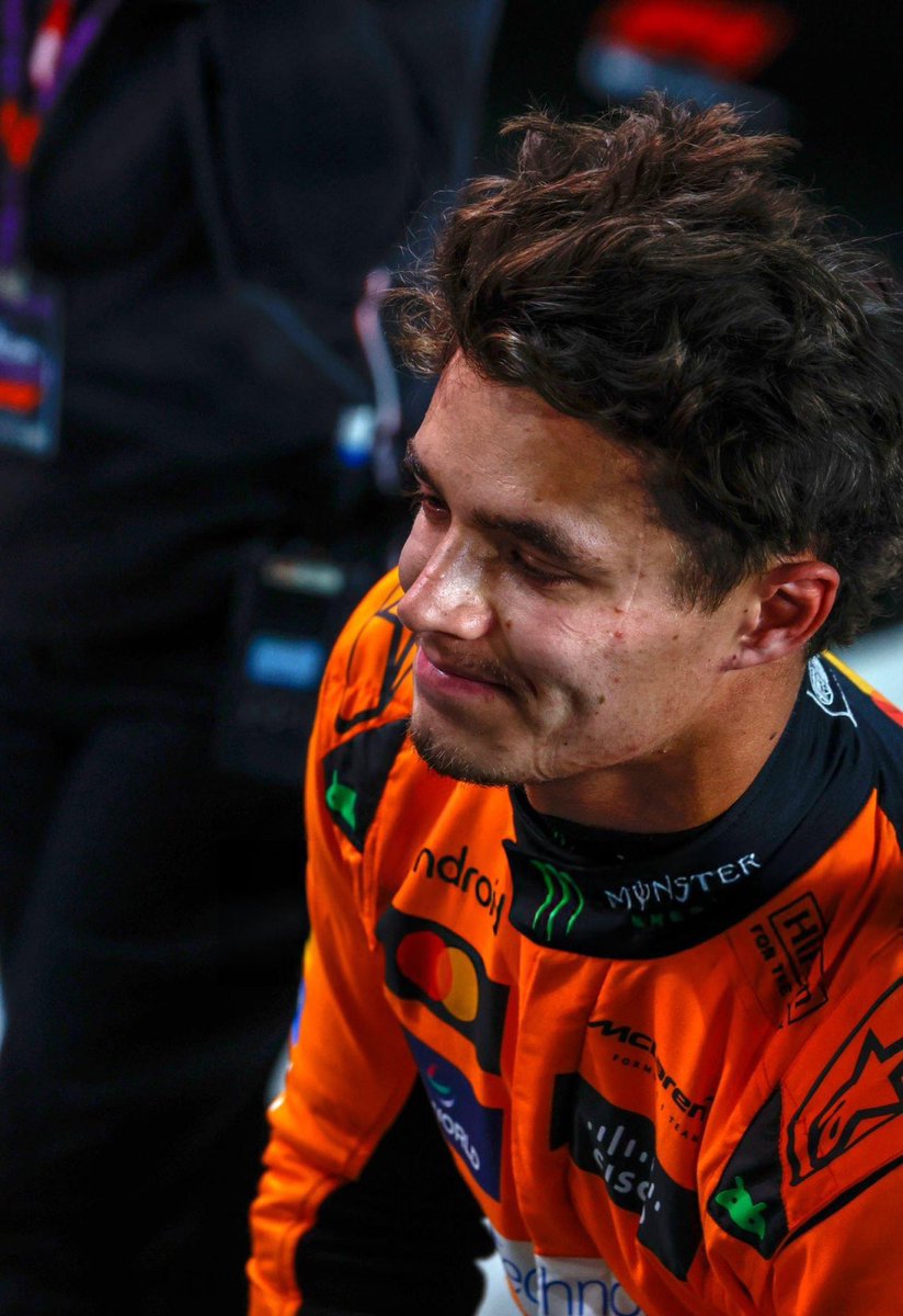 lovinorris's tweet photo. helmets off and hes just a man with deep dimple https://t.co/XmK7j2qbCU