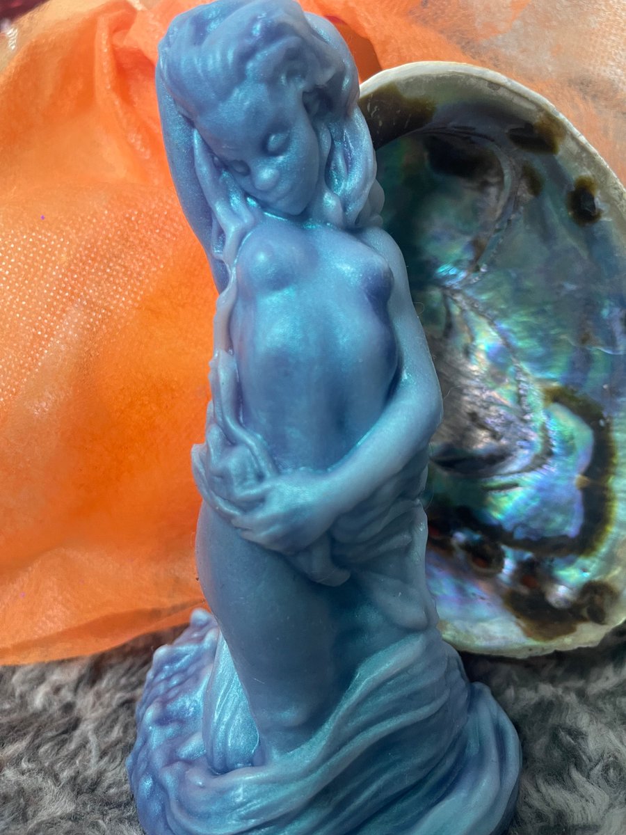 Isn't she beautiful? We love our mermaid toy.