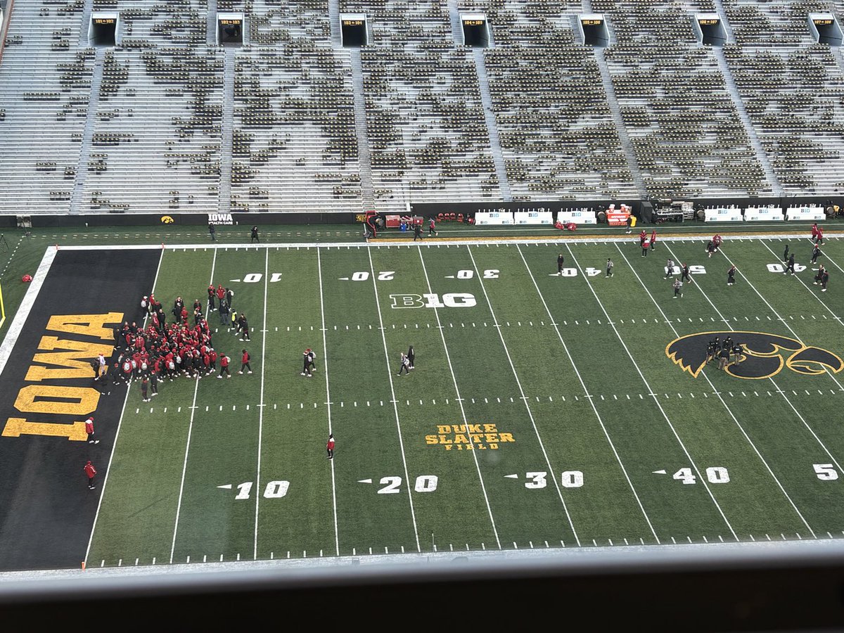swmckewonOWH's tweet photo. Nebraska held its usual pregame huddle in one end zone after law enforcement guarded the midfield logo. https://t.co/vxtDEC7Wnm
