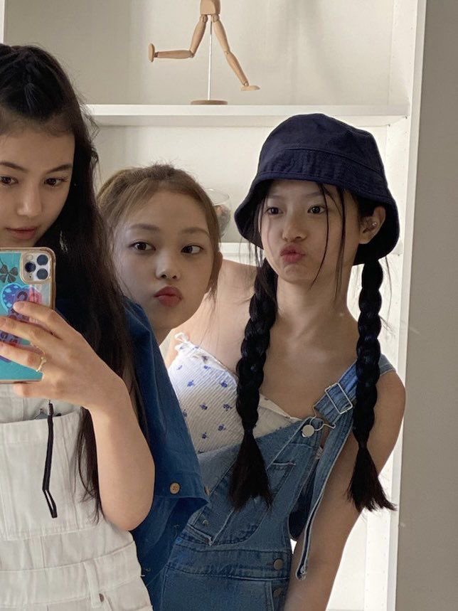 hanni looks tweet media