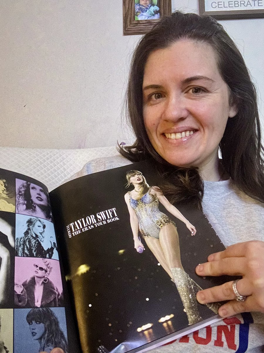 CourtneySong_'s tweet photo. My beloved #OfficialTSTheErasTourBook and me R-E-A-D-I-N-G @taylornation13 #tsthecardigancollection https://t.co/YfG3xxrBTy