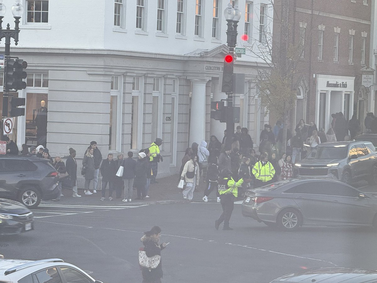 Does anyone know why four men wearing masks and hoodies just stopped their car in the middle of the intersection on M St. and Wisconsin Ave. this afternoon, walked out of the vehicle, and left it there? <a href="/DCPoliceDept/">DC Police Department</a>