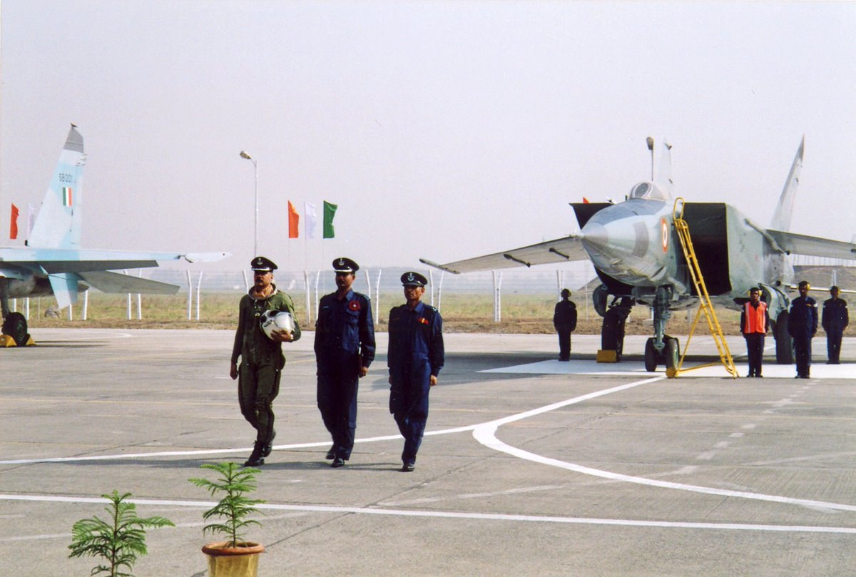 ReviewVayu's tweet photo. Some history from our Vayu Issue–3 (May/June) 2006 where we attended the phasing out ceremony at Bareilly, India.

The enigmatic MiG–25 served in the ultra-high altitude strategic reconnaissance role with the Indian Air Force for near 25 years from its induction on 17 August 1981 till its formal phasing out from service on 1 May 2006.

The ceremony at Air Force Station Bareilly that morning was precise if poignant when the CAS Air Chief Marshal SP Tyagi inspected the Guard of Honour even as two MiG–25s, followed by MiG–21Ms flashed overhead, landing soon after. The last official flight of MiG–25R ended with its touch down and taxing to a ceremonial halt where its pilot, Wg Cdr Sandeep Taliyan got down from the cockpit, smartly marched to the dais and handed over documents to the Air Chief.

📷 All pix VAYU.

1/3