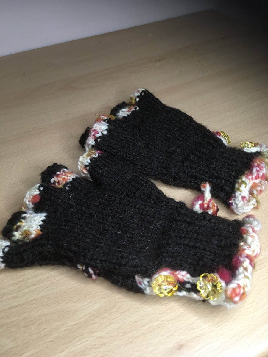 Fingerless mittens designed, spun and knitted by Claire Boley
