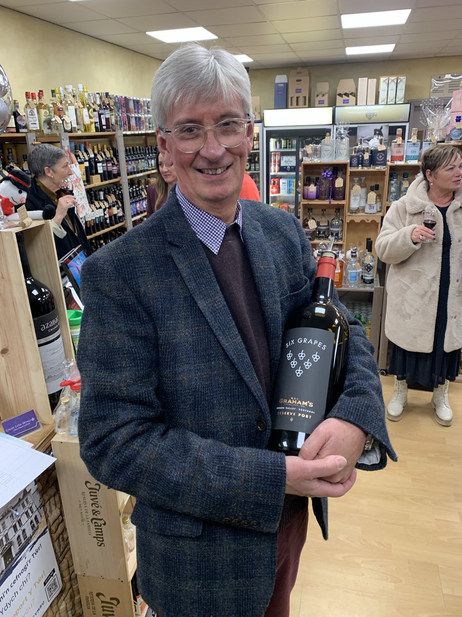 Customers enjoying the Graham’s Six Grapes Port served from a double magnum ⁦<a href="/FellsWine/">Fells Wine Importers</a>⁩