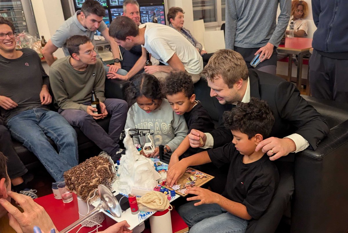 KevinReuer's tweet photo. Also the PhD students of @qudev made an amazing PhD hat, complete with a ski 🎿 mountain, a reinforcement learning agent game and a photon knitting machine!! And a Mathematica code reading exercise! https://t.co/5I9xhgYd0m