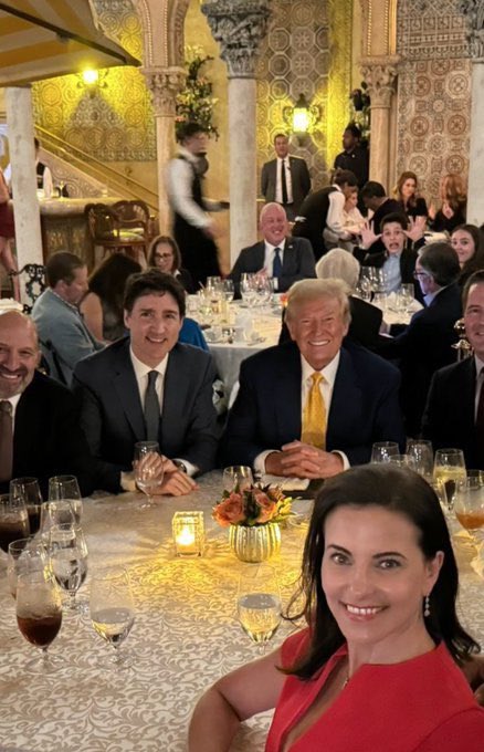 AFpost's tweet image. Justin Trudeau pictured smiling with Trump at Mar-a-Lago.

Follow: @AFpost