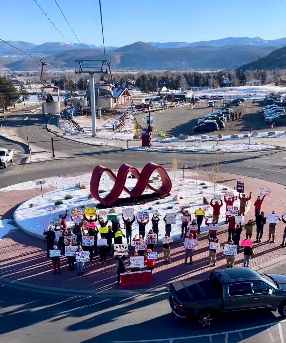liftblog's tweet photo. Unionized ski patrollers and supporters are picketing under the Canyons Village Cabriolet at @PCski today. Skiers have to ride right over them. https://t.co/kKqjXcvQUe