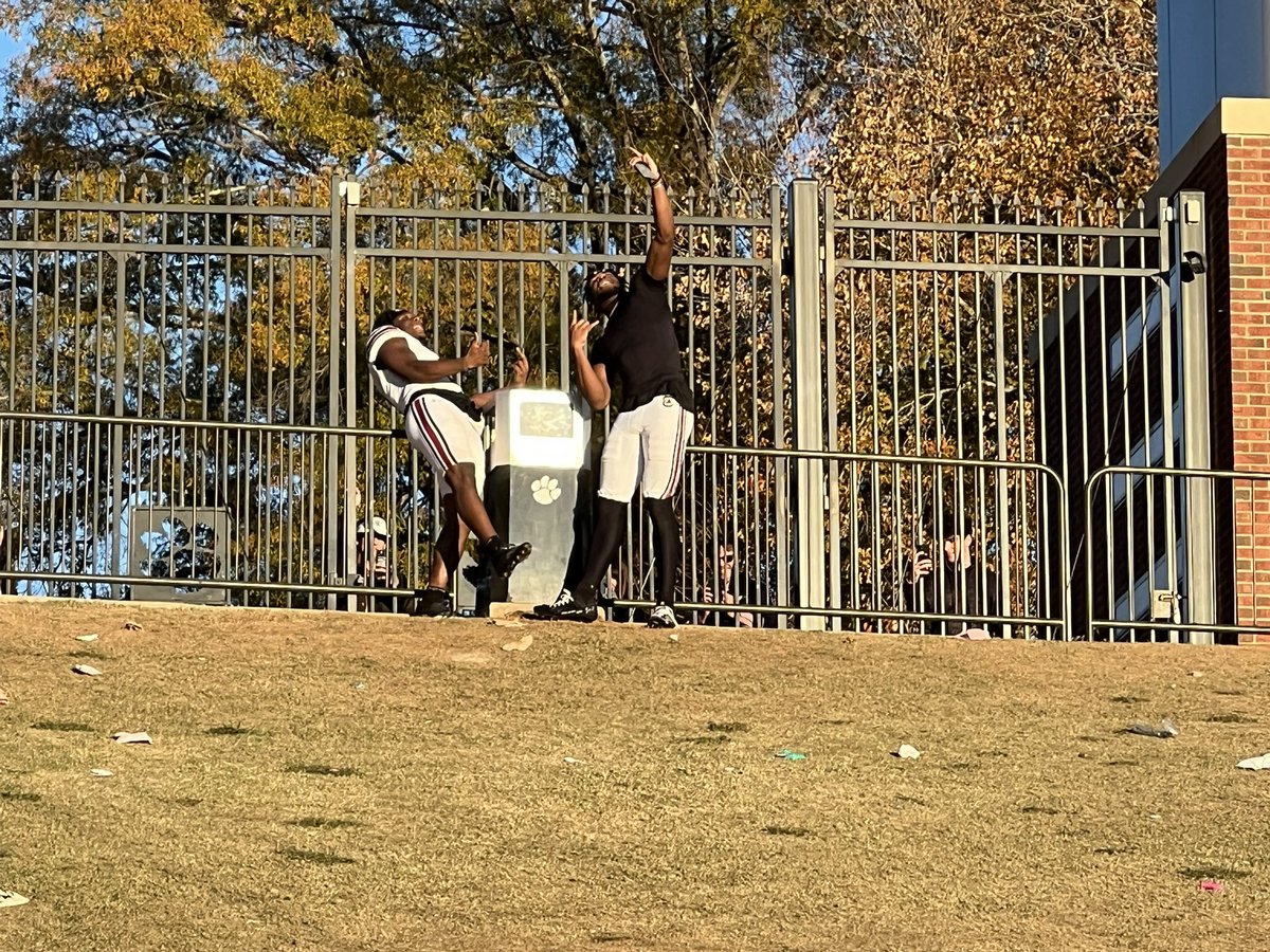 Jacktveltri's tweet image. Nick Emmanwori and DQ Smith running the length of the field and up the hill behind the end zone to go to Howard’s Rock.

Insane.