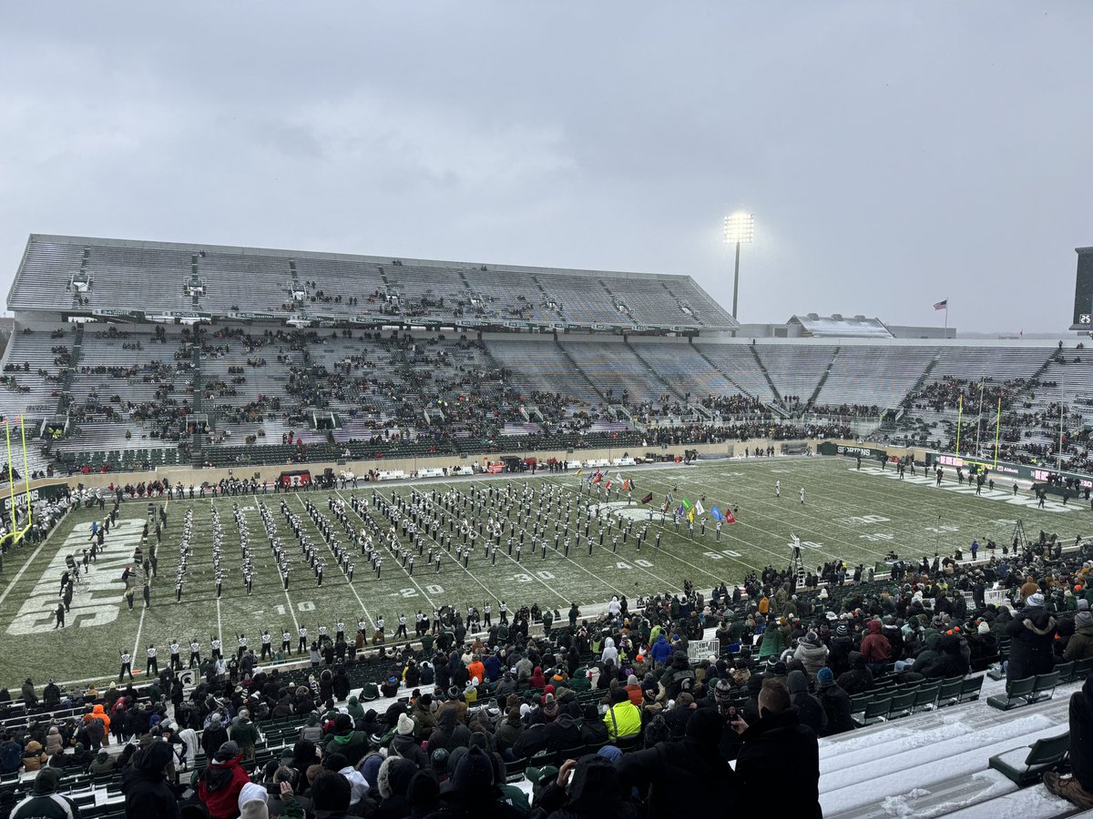 I’m here with all the Spartan diehards enduring 14° and snow, but would much prefer to be indoors at