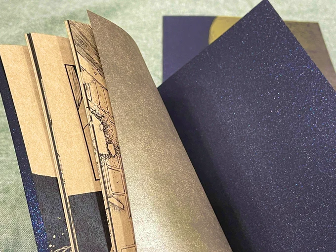 新刊の装丁!ミランダ黒に金インクと黒!渋い銀色みたいな金色の遊び紙(裏面クラフト)に本文クラフト!!!!うおーっ!やりたかったやつできたぞ! 