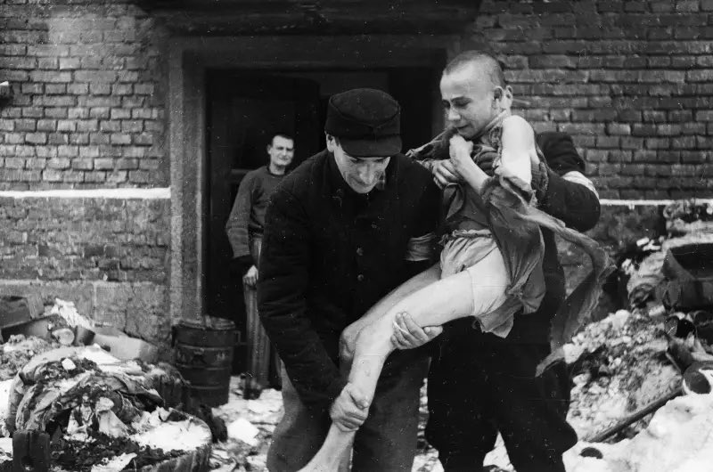 The inhumanity of Auschwitz, February 1945.
A 15-year-old Russian boy, Ivan Dudnik, is rescued. The teen was brought to Auschwitz from his home in the Orel region by the Nazis.
He had gone insane from witnessing the horrors of the camp