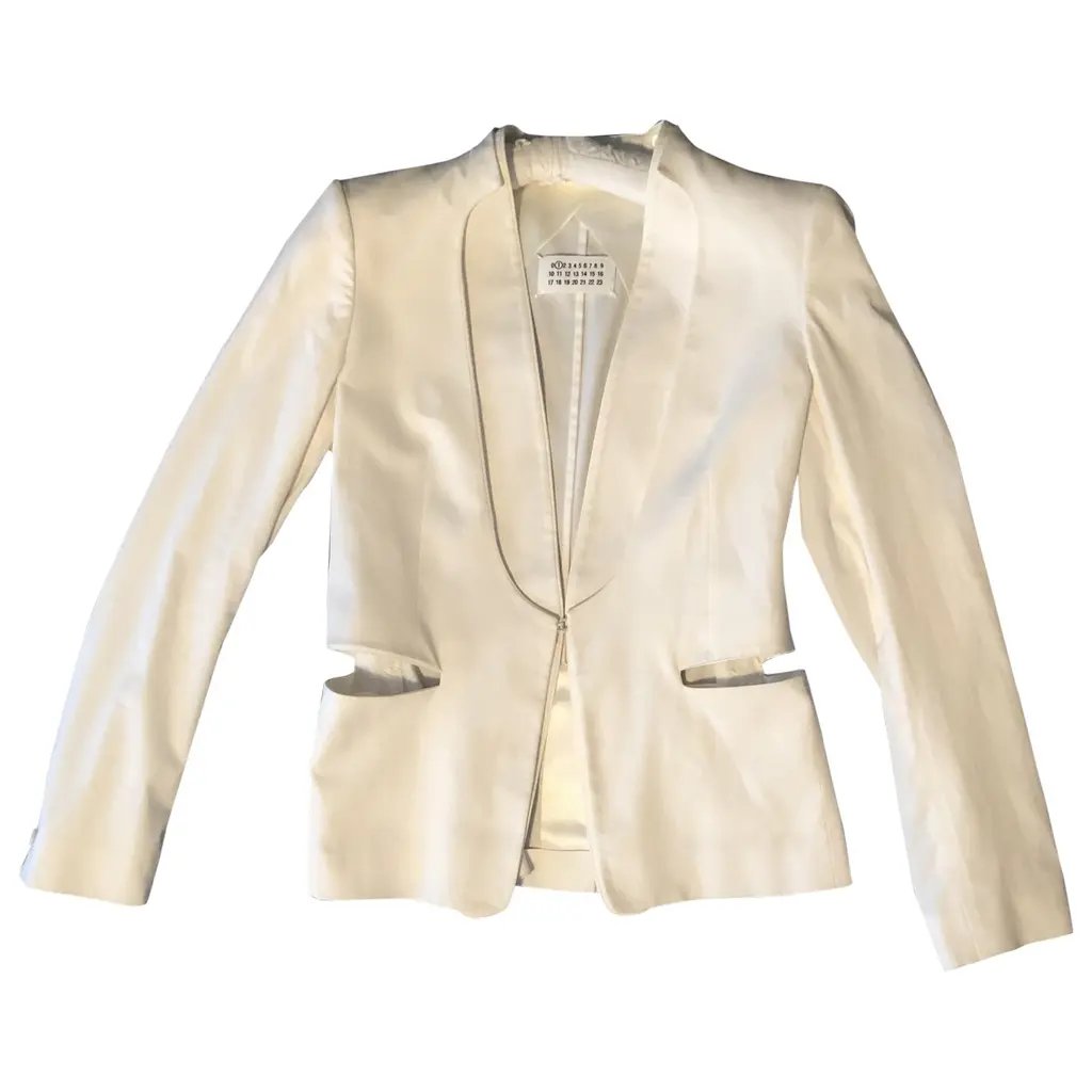 La Maison Gaga (@lamaisongaga_) on Twitter photo Finally found one of Gaga's favorite blazers worn back in 2009! An interesting tuxedo jacket in white with cut-out pockets by <a href="/Margiela/">Maison Margiela</a>! Finally found one of Gaga's favorite blazers worn back in 2009! An interesting tuxedo jacket in white with cut-out pockets by <a href="/Margiela/">Maison Margiela</a>!