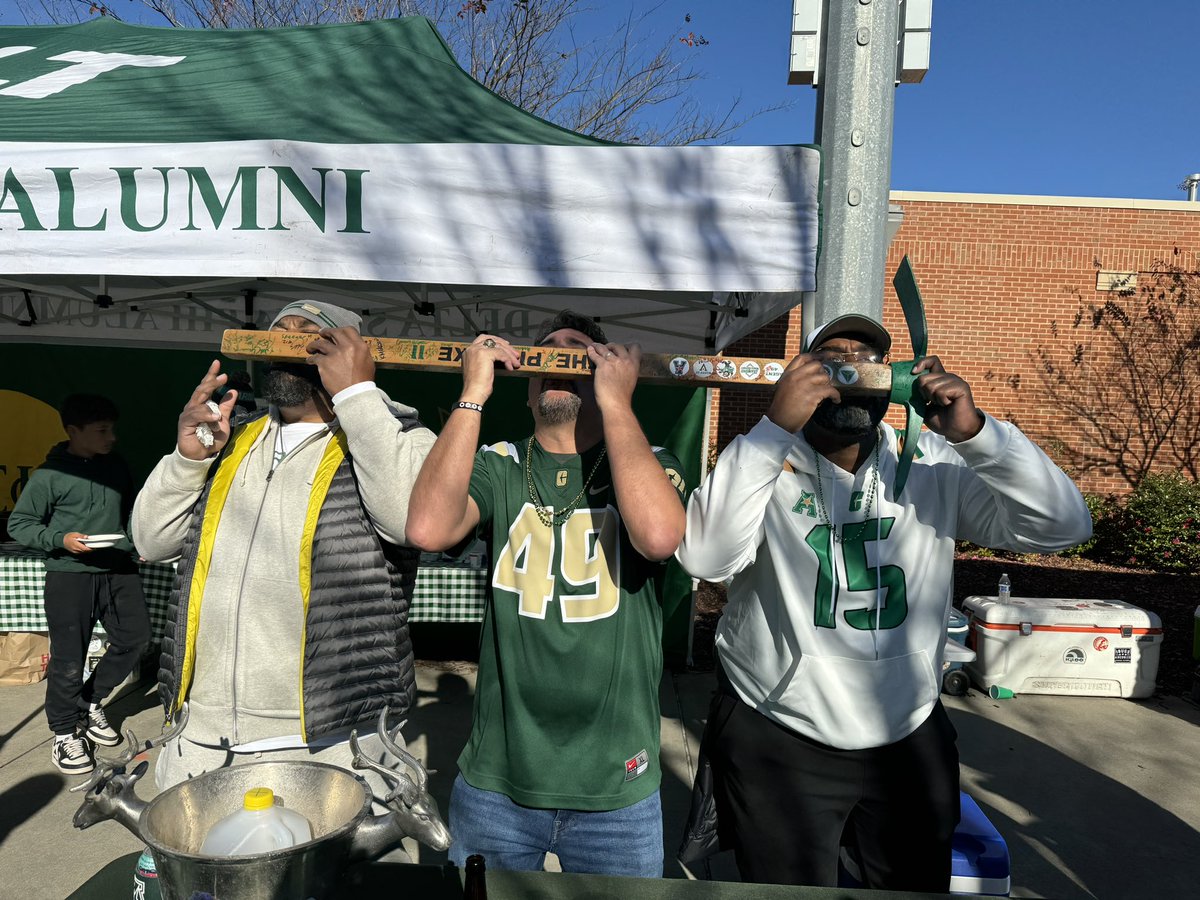 pickaxeshot's tweet photo. Awesome getting the @Dpurdie0 Clan to join @jimmytouchstone and crew for a #PickAxeShot or two. Hope we see 15 back in gold and green for @CharlotteFTBL again!!! πβπ https://t.co/Hwm4lD1rFG