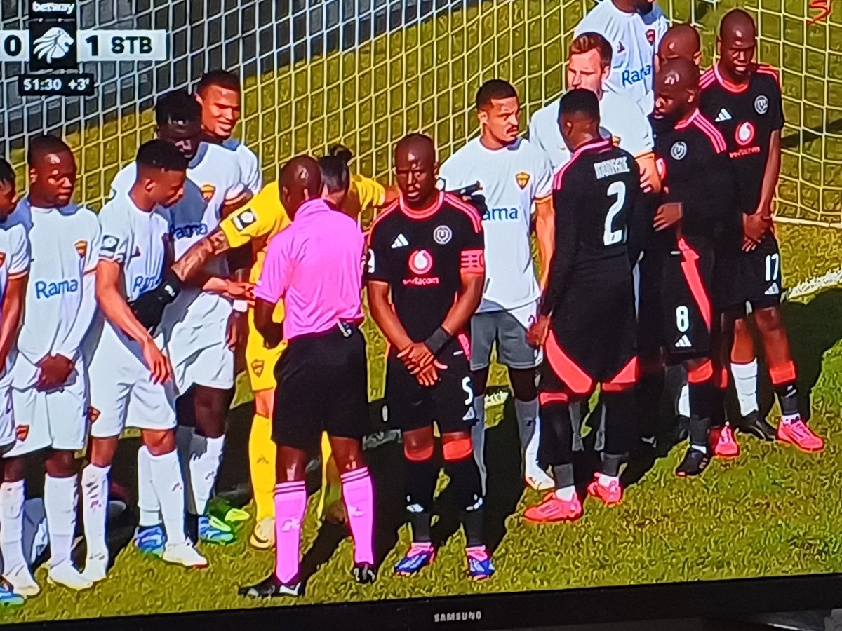 What are Fifa rules under the circumstances? In my book referee should have ordered a penalty and not free kick, as it were.