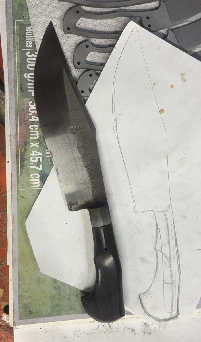 ouroboros_forge's tweet image. Handle is sculpted and ready for glue up, but first I will finish out the blade and reveal that hamon.