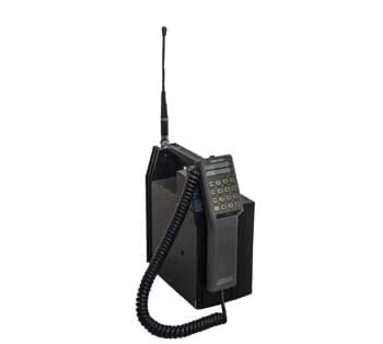 Does anyone remember using a mobile phone like this?

These phones were some of the first to be used on the 1G analogue systems of the 1980s.

This one, a Vodafone Mobira VT1 Talkman was introduced in 1985.