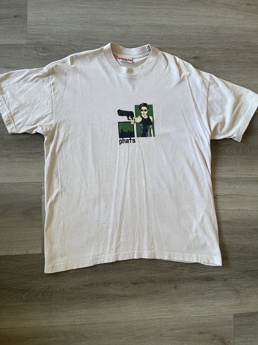 TraitMerch's tweet image. PHATS White Rabbit Tee (as seen on Travis Scott Ps5 reveal) 

$50 shipped 🇺🇸