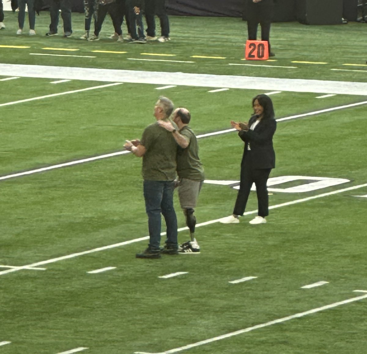 johnkriesel's tweet photo. My favorite photo from the day. My best friend and me during halftime on the field of our favorite football team. There are no words to explain this friendship and what this man means to me. https://t.co/mn0Jy2z60q