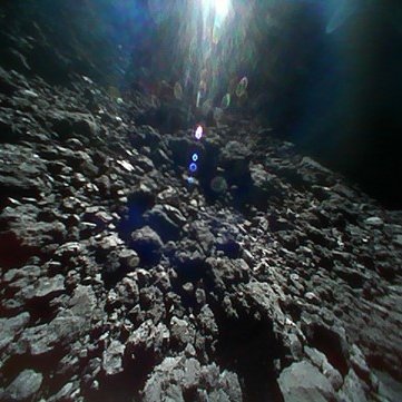 CuriosityonX's tweet photo. This photo was taken by a robot ON THE SURFACE OF AN ASTEROID https://t.co/bP7tyBai8W
