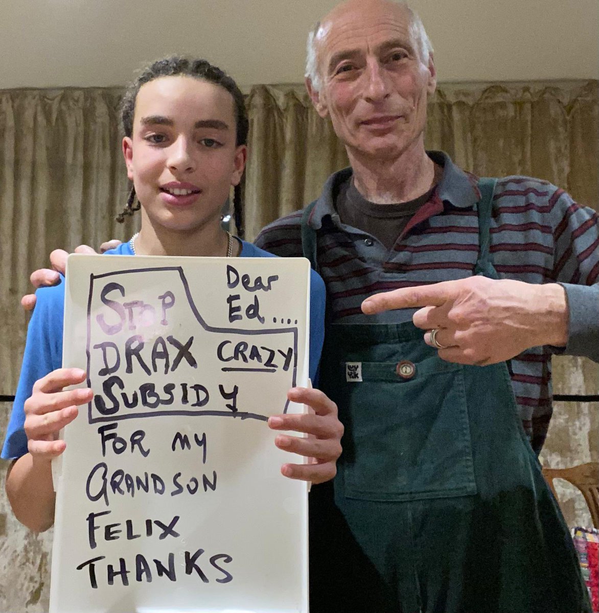 Asking <a href="/Ed_Miliband/">Ed Miliband</a> not to subsidise <a href="/DraxGroup/">Drax</a>. The next generation can’t cope with more fossil fuels being burnt - don’t believe that carbon capture #greenwashing nonsense! Here’s my dad and his grandson making their plea.. #stopburningtrees