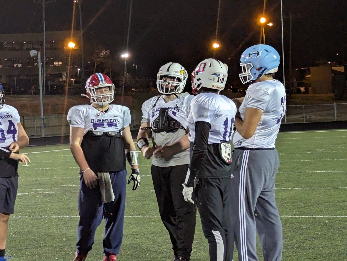 West Team Offensive Line and Olympic TE DeAngelo Hall get the huddle together. Thomas Wakefield of Catholic, Hopewell 's Jackson Kerley, &amp; Christian Garcia of Southlake Christian join him. Day 1 West Practice #WEHAVECHARLOTTE