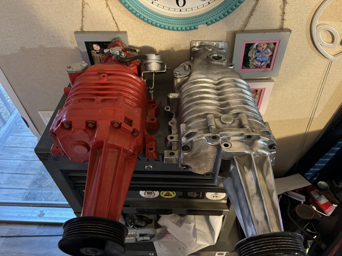 uhhAlienz's tweet photo. Both of my Eaton M90 Superchargers. Red ones a Gen III and the silver/raw casing one is a Gen V. Gen V is getting rebuilt with ZZPs aluminum vacuum tree, Billet Bypass Actuator, upgraded coupler, and dress up bolt kit. When the Gen V is done it’s gonna be blue with red ascents! https://t.co/JZntWv3sap