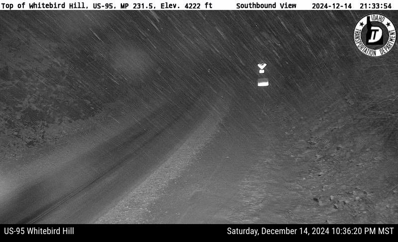 NWSMissoula's tweet photo. [9:42pm PST 12/14] It's snowing at Whitebird Hill #US95  Snow will taper off by 1am Sunday morning. #idwx https://t.co/3v6lJnsOpa