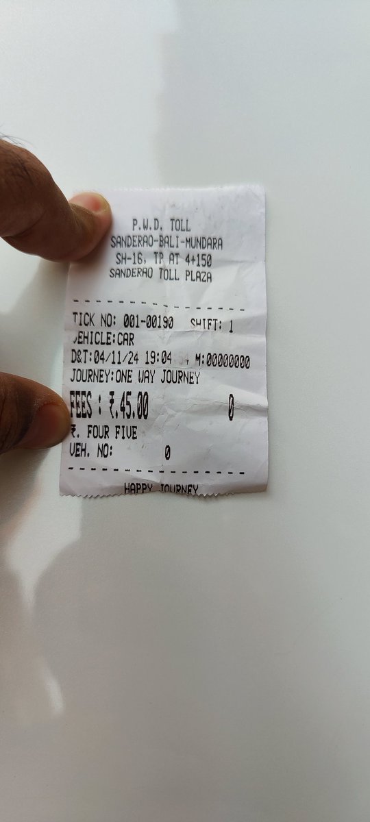 dhavaljshah's tweet photo. Why do they collect the tax in cash? Isn't it now illegal? @nitin_gadkari @RajCMO https://t.co/Cu2zVaNokO