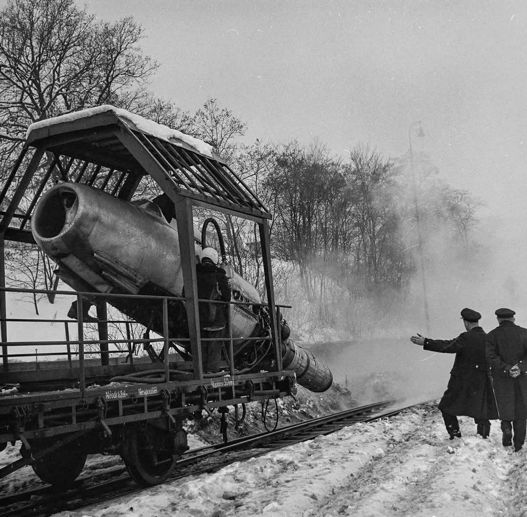 DerHauptman12's tweet photo. Czechoslovak railroad workers defrosting railroad tracks using a MiG-15 engine during a severe snowstorm in 1970. https://t.co/nFLI6vgulb