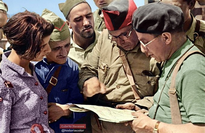 Nick Lloyd (@civil_war_spain) on Twitter photo Soviet journo Mikhail Koltsov (right) discussing battle map with anarchist leader Buenaventura Durruti. Bujaraloz, Aragón 16 Aug 1936. 17yearold Marina Ginestà (Barcelona Hotel Colon photo) on left interpreting for group in French. Photo Juan Guzmán, colourised by <a href="/historiacolor/">Rafael Navarrete</a> Soviet journo Mikhail Koltsov (right) discussing battle map with anarchist leader Buenaventura Durruti. Bujaraloz, Aragón 16 Aug 1936. 17yearold Marina Ginestà (Barcelona Hotel Colon photo) on left interpreting for group in French. Photo Juan Guzmán, colourised by <a href="/historiacolor/">Rafael Navarrete</a>