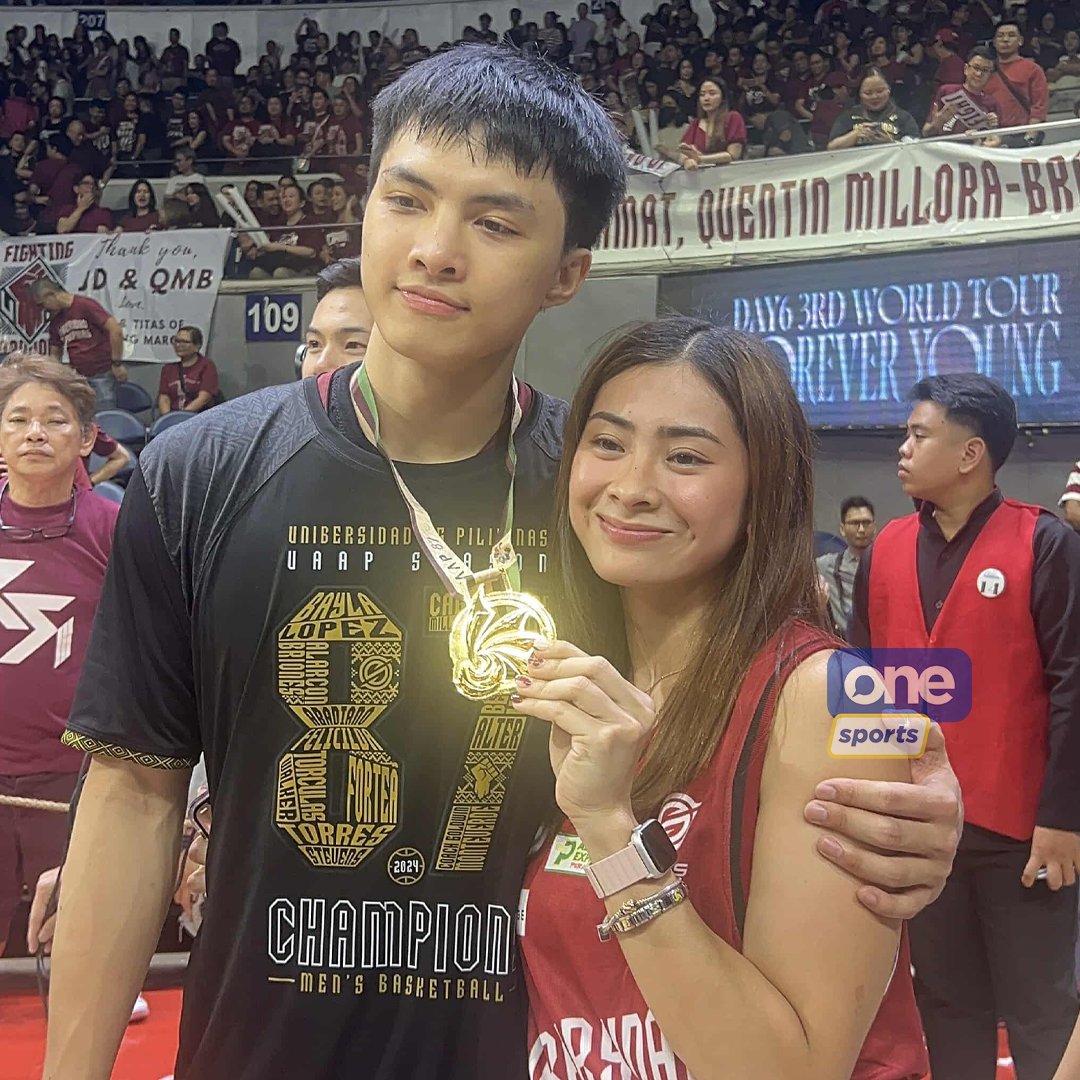 OneSportsPHL's tweet photo. CHAMPION PATI SA LOVE LIFE😍

Harold Alarcon shares a sweet moment with his partner and volleybelle Roma Mae Doromal after UP reclaimed their glory against DLSU at the #UAAPSeason87 men's basketball! | via Xander Cipriano, Kiko Demigillo

#StrongerBetterTogether #OneSports https://t.co/bc4mjeRxB8