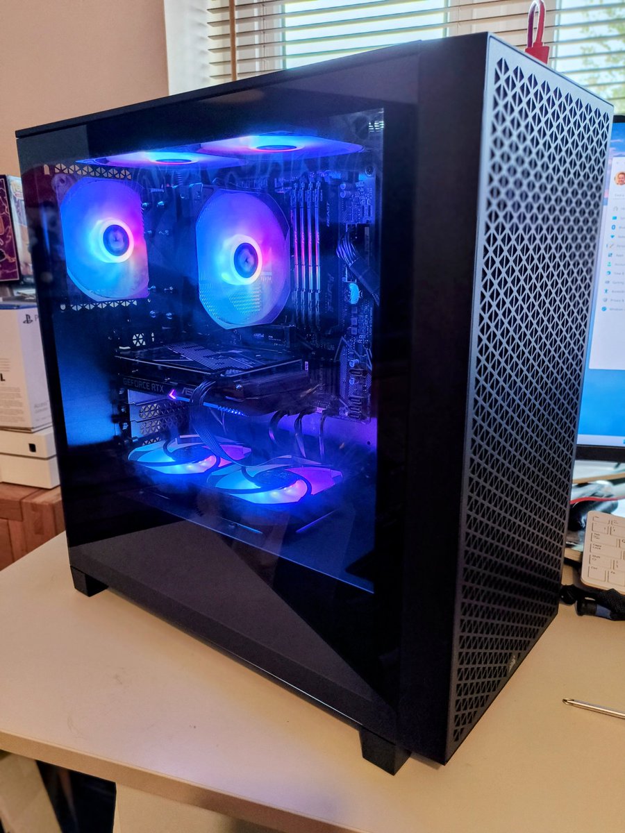 Finished product. A Christmas present for a 13 year old. AM4 motherboard, Ryzen 5600G CPU, 32 GB RAM, Nvidia RTX 3060 Ti, 1 Tb NVME storage, 9x 120mm fans (6 with RGB). Someone's gonna be happy Christmas morning !