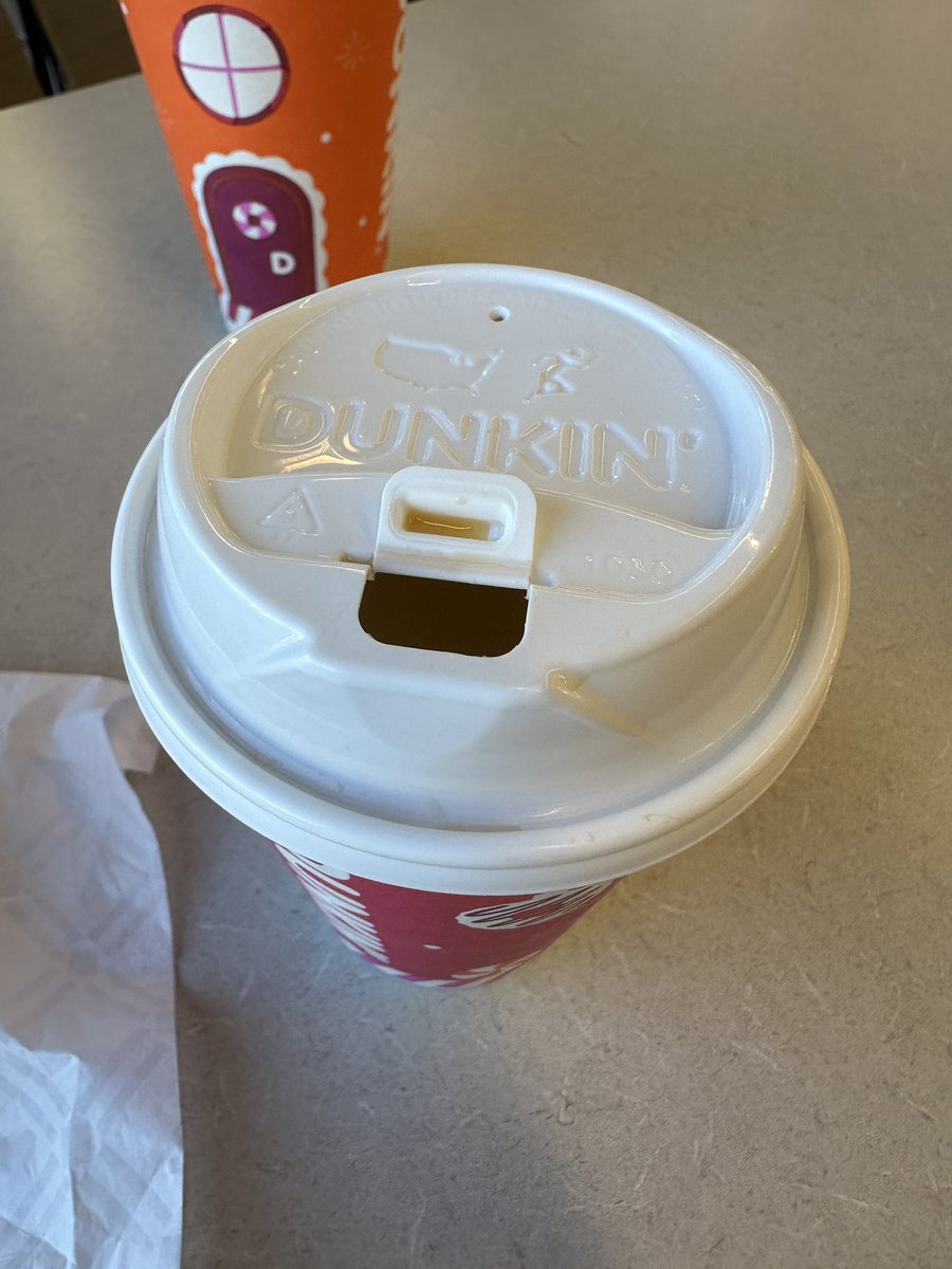 JoeCap393's tweet photo. @dunkindonuts please go back to the old style lids.  These are list not good.  It spills out constantly when drinking. https://t.co/nA4yQVxYWB