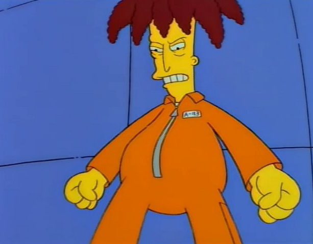 Sideshow Bob in a prison uniform