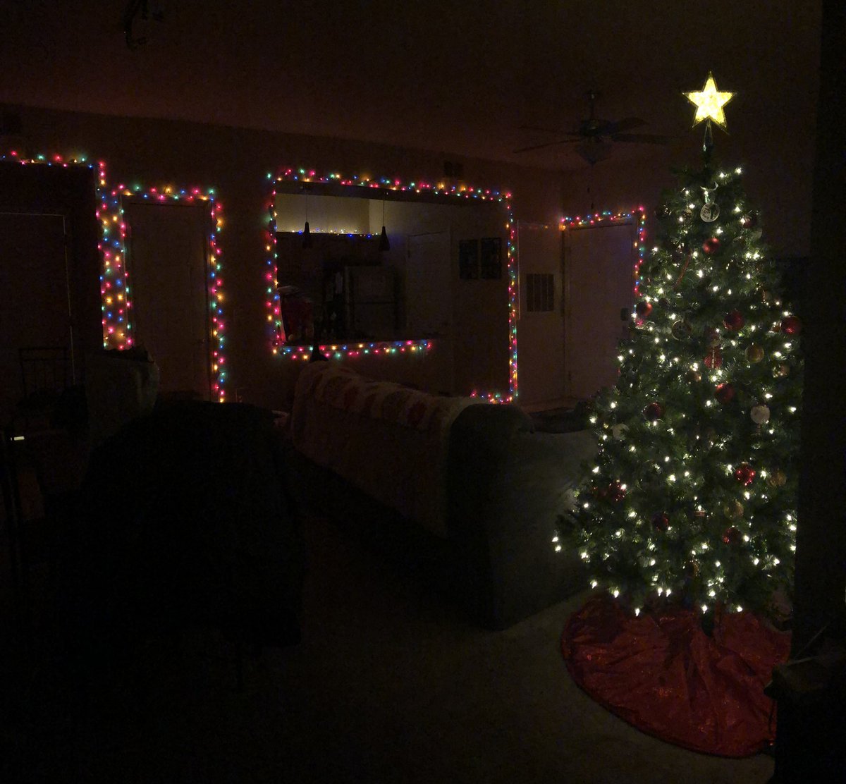 hauntedgetaway's tweet photo. @redintodaylight lol my living room a few years ago. i haven't had the energy to put them up this year 🫠 https://t.co/lz9VrAqlLQ