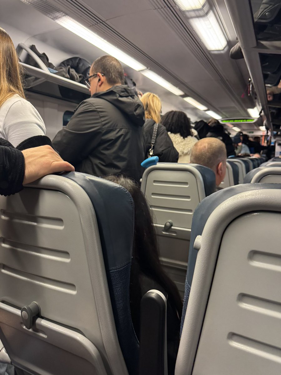 Superboooo's tweet photo. @nationalrailenq is there a legit reason why all the trains are like this in the UK? I am lucky to have a seat but this lot have over 2 hours to go 😳 https://t.co/M2S5xl2uO2