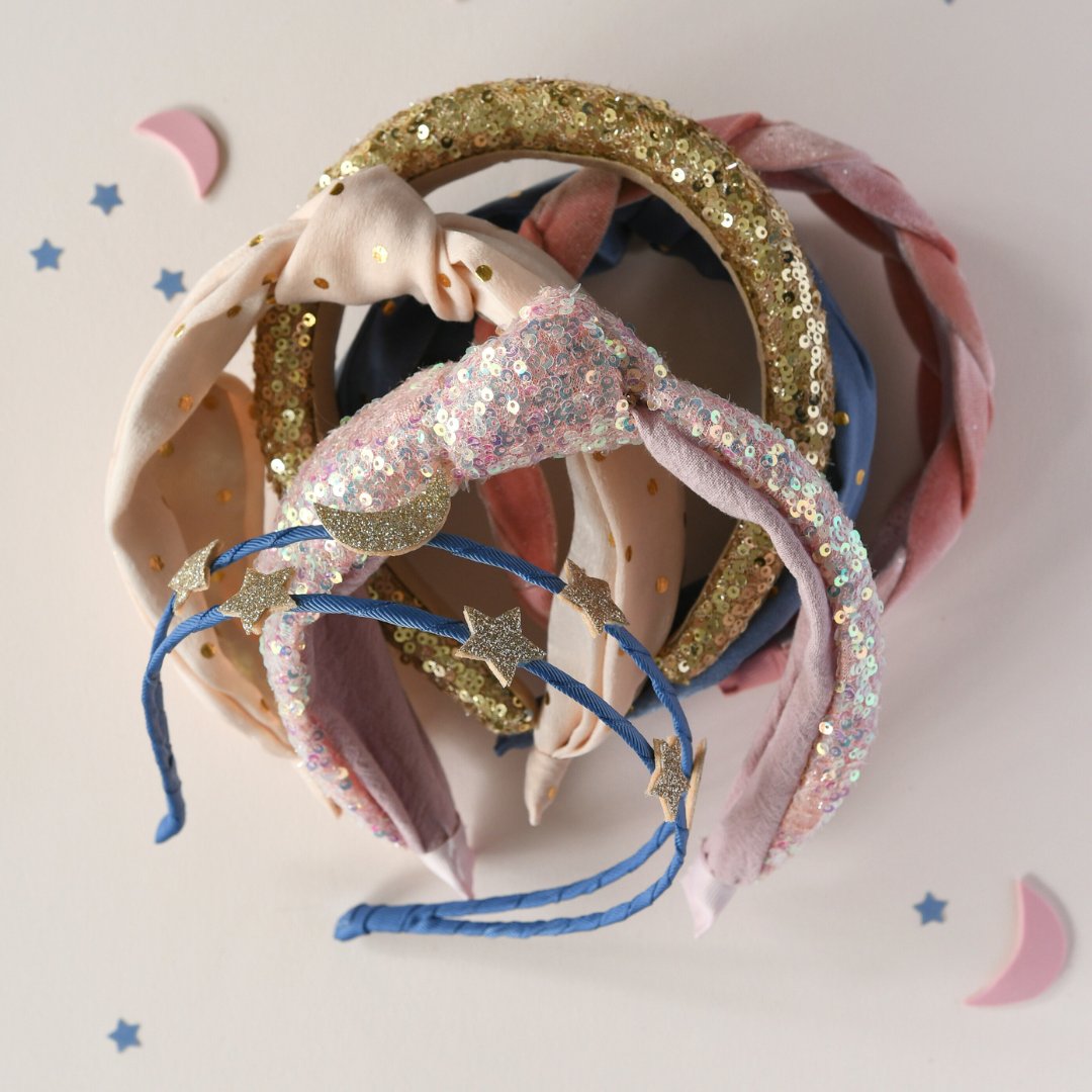 ✨ Sparkle &amp; Shine with Our Alice Bands! ✨  

Our glittery Alice bands are perfect for adding festive flair to any outfit 🎀. Stylish, comfortable, and full of charm, they’re a must-have for sparkle season! ❄️🎁  

#girlsaccessories #hairaccessories #christmas #xmasgifts