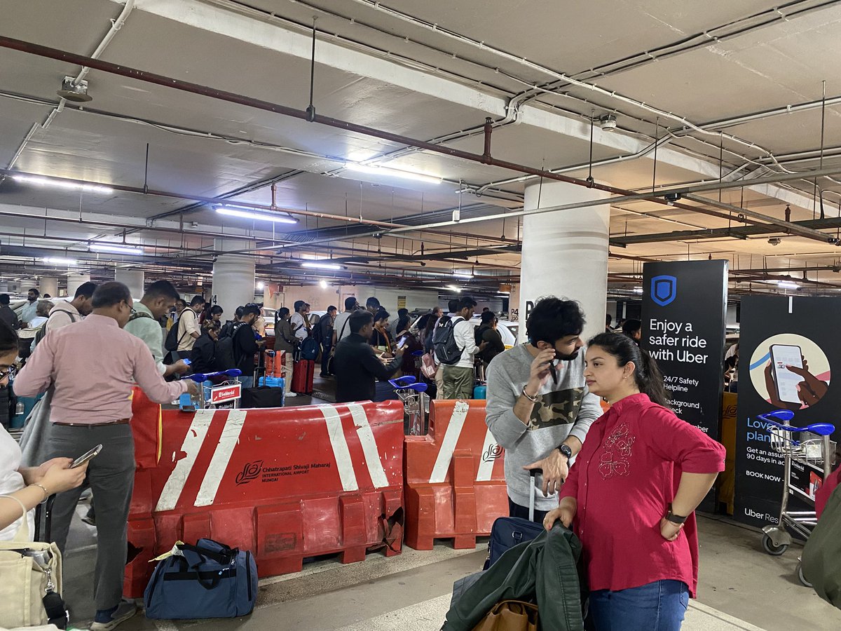 Complete mess in Mumbai Airport Uber pickup area P4. No one to manage, horses are walking all over to find their cabs.

Better to allow all local cabs to roll in.

<a href="/Uber_India/">Uber India</a> 
<a href="/DGCAIndia/">DGCA</a>