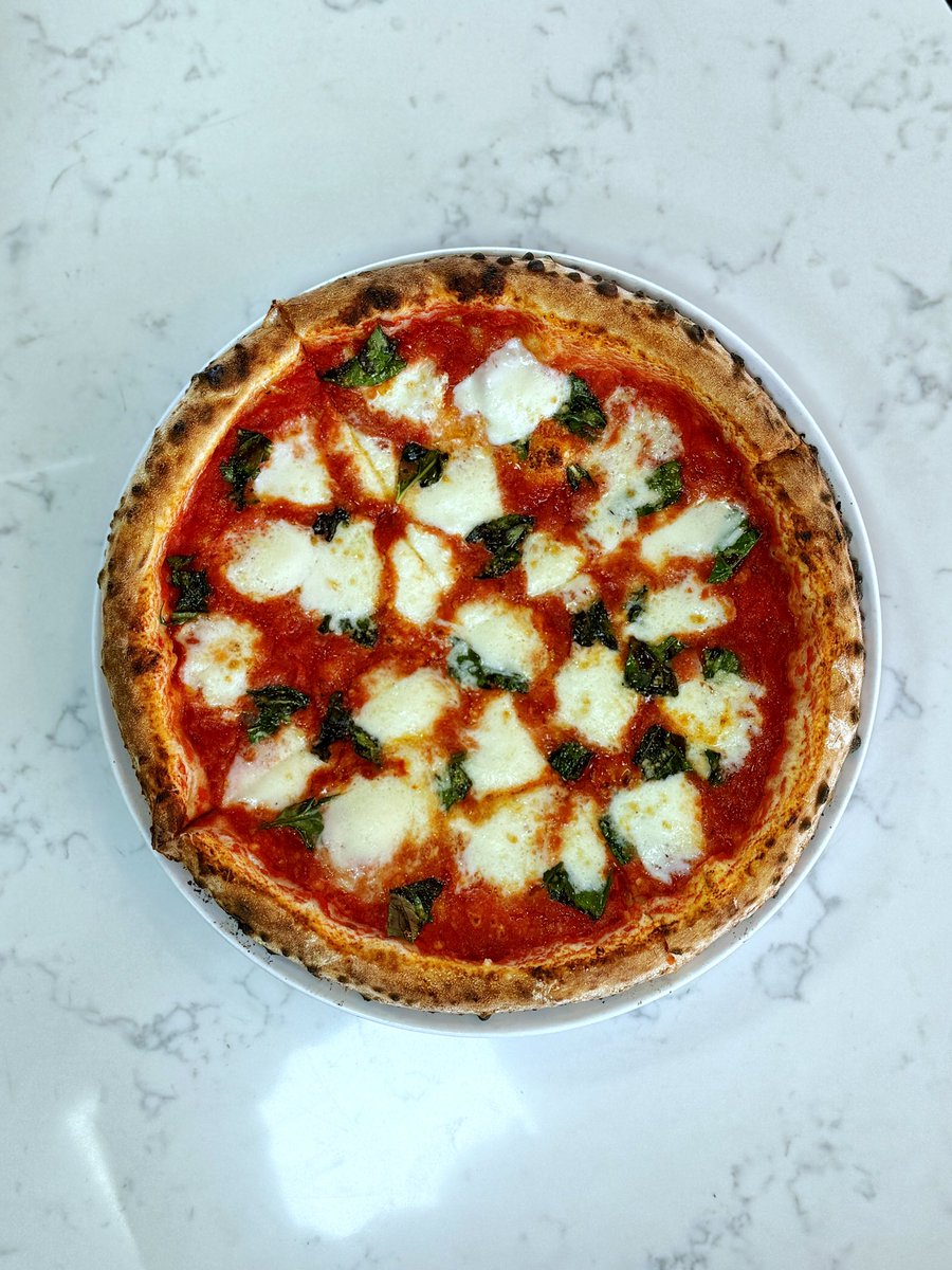 Say hello to our iconic VPN Certified Margherita pizza. Topped with Buffalo Mozzarella, house-made Pizza Sauce, and Fresh Basil - the ultimate trio!👌