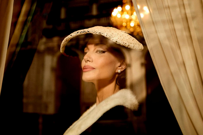 CinemaTweets1's tweet photo. Angelina Jolie delivers one of the best performances of her iconic career with her latest film #Maria (🌟🌟🌟🌟). This is a good film carried by a great performance. I’ll get into some of my issues with the movie itself in more detail below, but Jolie absolutely deserves all the acclaim for her portrayal of Maria Callas. Her performance alone elevates this film. I would be stunned if Jolie missed out on an Oscar nomination. 

Maria is the story of the life of the iconic opera singer Maria Callas. The film takes place in the 1970s in Paris near the end of Maria’s life, as she reflects on the highs and lows of her famed career, all of which have left her alone & lost in her final years. The storytelling & filmmaking in Maria is undeniably similar to Bradley Cooper’s Maestro: there’s use of black & white to show past sequences of Maria’s life, there’s an enormous amount of introspection on the part of the titular character, and the massive set pieces recreating some of the Maria’s best performances are the highlight of the film, all of which are similar to Maestro. While Maria excels at the performance set pieces in the same way Maestro did, just like Maestro, Maria’s biggest downfall is its writing. The writing here is not exceptional. 

But Angelina Jolie is exceptional. Jolie makes up for average writing & slow pacing with her brilliance. Every moment Jolie is on screen is electric. Her ability to act through facial expressions, in particular her eyes, is a gift that very few actors can master. She’s both tremendously confident & tremendously vulnerable at the same time throughout this entire film. And above all, Jolie’s singing knocked me on my ass. 

I wrote yesterday about Matt Damon & how he’s a uniquely intelligent actor. I consider Jolie to be in the same category as Damon: she is one of the most thoughtful actresses in Hollywood history & she picks her roles very carefully. Whenever Jolie decides to jump, I always try to consider the reasons why Jolie picks a project. 

Here, it’s clear. The similarities between Maria’s life & Jolie’s life are undeniable. Two gifted & extraordinarily talented women who needed to fight for agency over their own lives throughout their careers, despite all their talent & success. Jolie empties her soul into this film & you can feel it. When the credits roll on this movie & the film wraps, it’s obvious why Jolie chose to embrace such a difficult role. 

Angelina Jolie is an icon & Hollywood legend. Maria is just more proof of that statement.